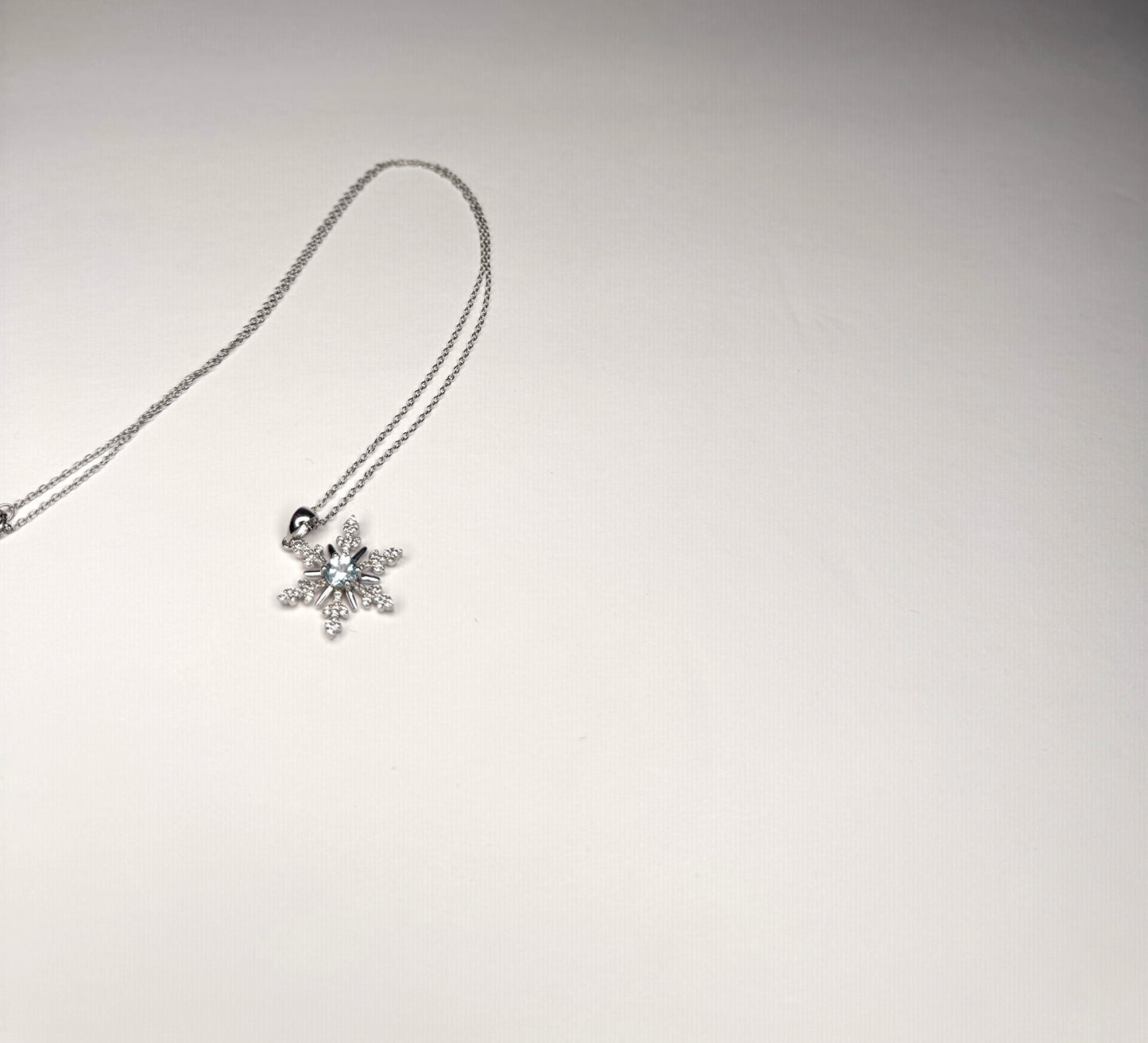 Sterling Silver Genuine Blue Topaz Snowflake Necklace