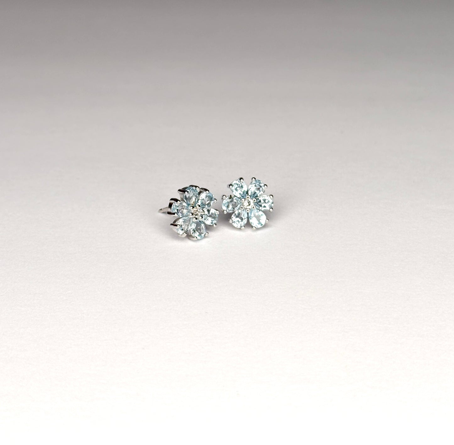 Sterling Silver Genuine Blue Topaz & White Topaz Stud Earrings