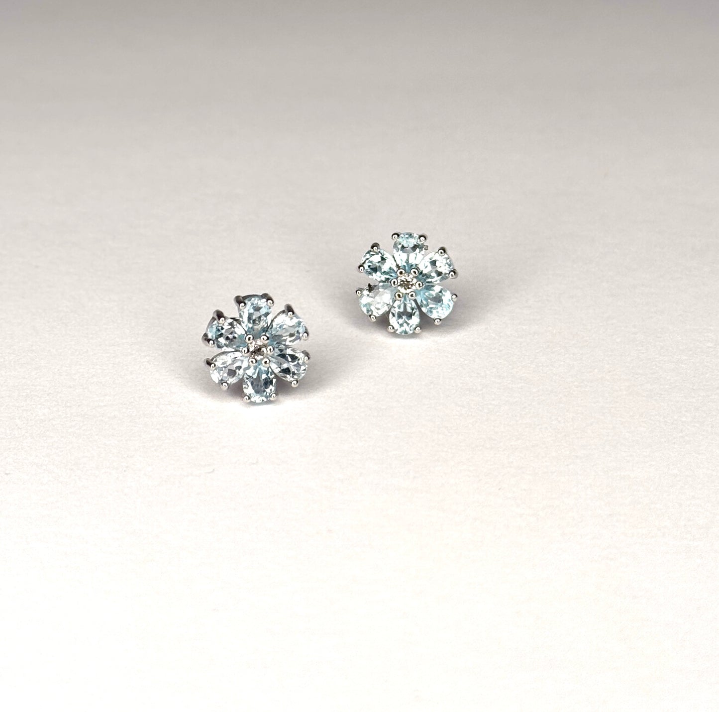 Sterling Silver Genuine Blue Topaz & White Topaz Stud Earrings